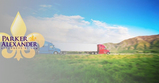 large commercial trucks passing one another