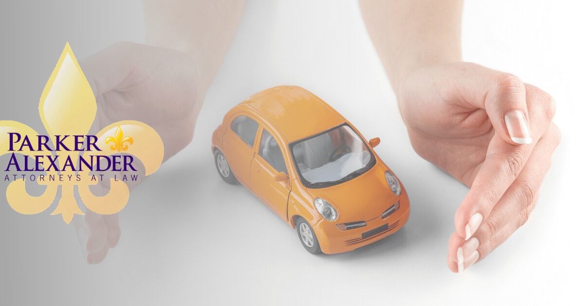 woman's hands around toy car