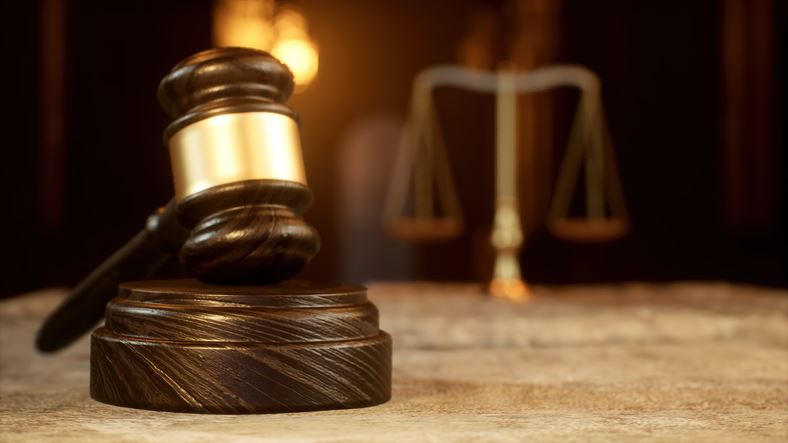 gavel with scales in background